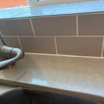 Kitchen backsplash grout sealing to prevent mold and moisture damage in Tucson